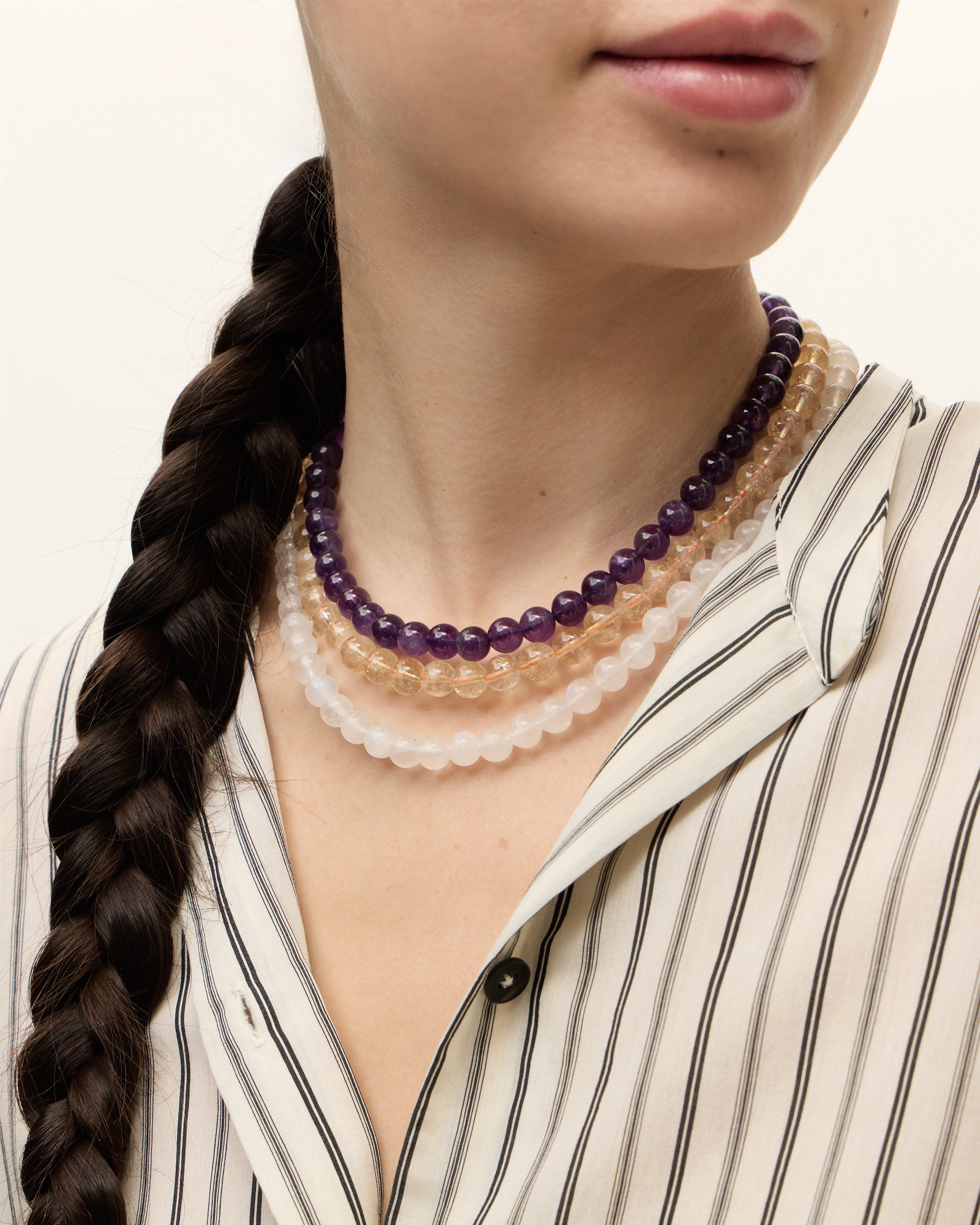 ETERNA VÉLA Amethyst / ETERNA SOLIS Citrine / ETERNA LUNOR Moonstone necklace with raw polished quartz point pendant, gold 8 cm extension chain and clasp, arrowhead-shaped fantasy signature, and 8 mm faceted amethyst / citrine / moonstone bead strand.