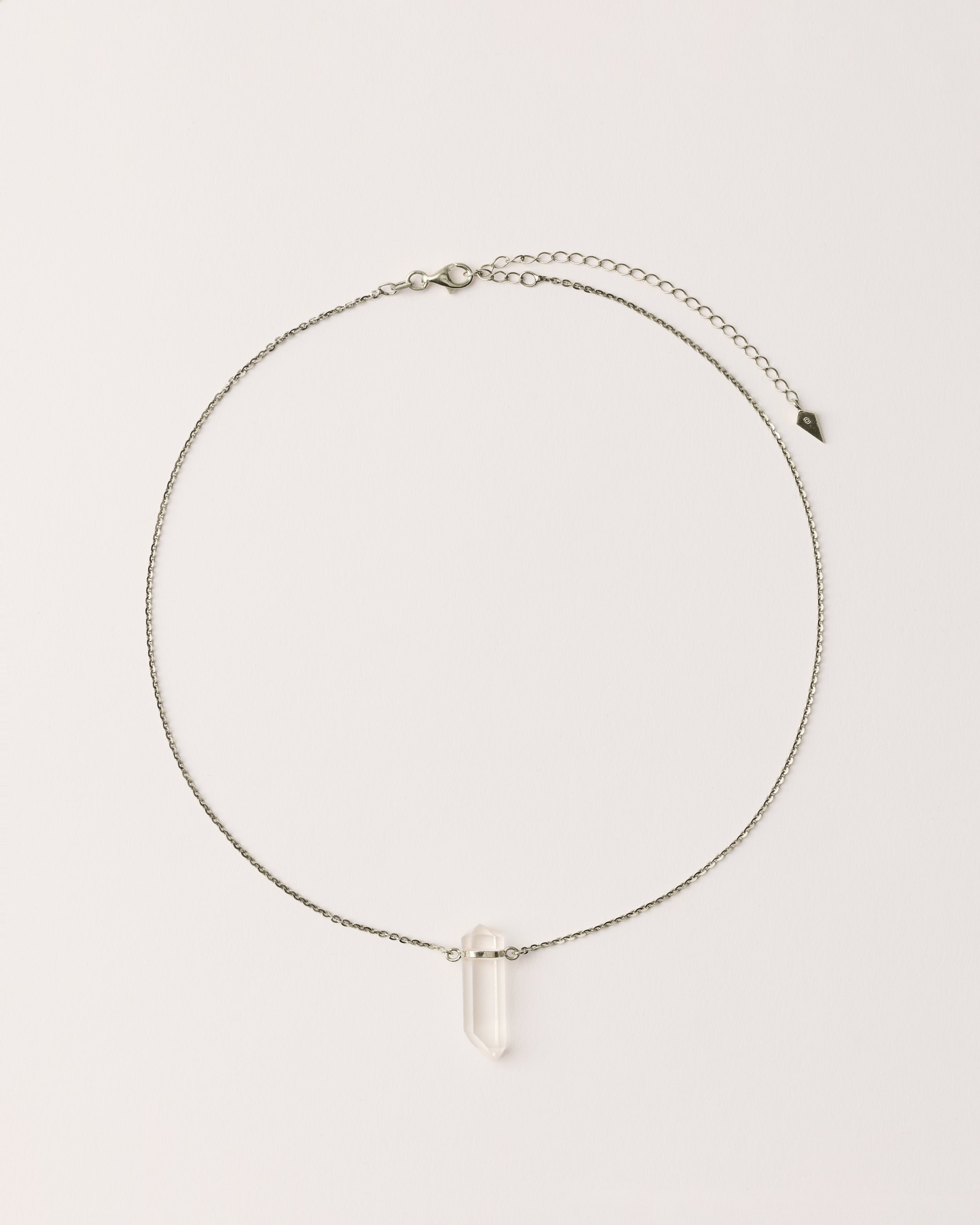 ENCARA Clear Quartz necklace with raw polished quartz point pendant, silver solid anchor chain, 8 cm extension chain, arrowhead-shaped fantasy signature.